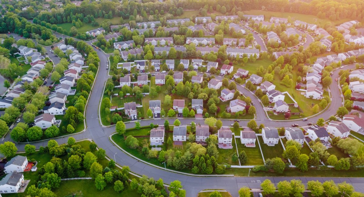 Aerial top view with from flying drone over residential district development buildings
