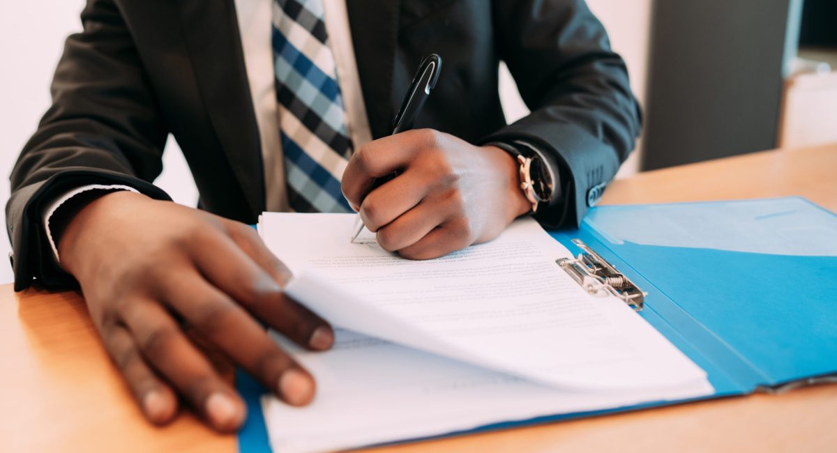 Professional businessman working with documents at his modern office. Business concept.